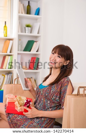 Chinese female online shopping with lifestyle background