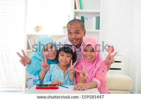 malaysian malay muslim family learning together with lifestyle background