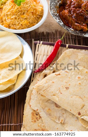 Chapati or Flat bread, Indian food, made from wheat flour dough. Roti canai and curry.