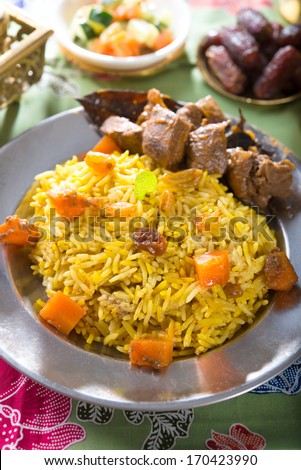 Arab rice, rice with meat and carrot in a bowl. Middle eastern food.