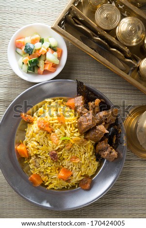 Arab rice, rice with meat and carrot in a bowl. Middle eastern food.