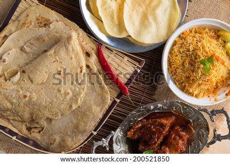 Chapati or Flat bread, roti canai, Indian food, made from wheat flour dough. Roti canai and curry.