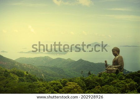 Hong Kong, Lantau Island Giant Buddha of Po Lin Monastery far away view during sunrise