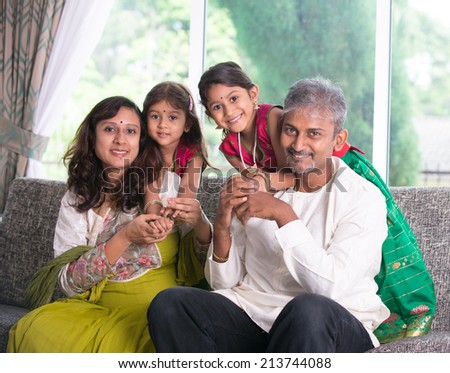 happy indian family enjoying quality time at home indoor