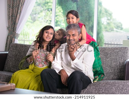 happy indian family enjoying quality time at home indoor