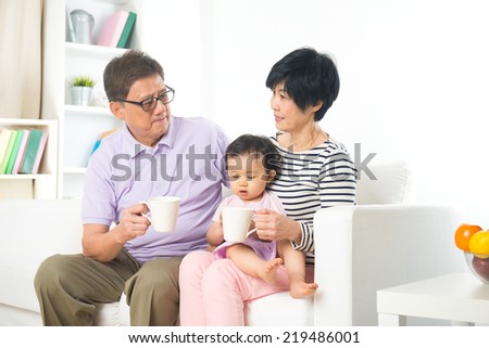 asian grand father with grand daugther with life style background