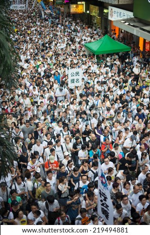 HONG KONG, JULY 1: People protest on the street in hong kong on 1 July 2014. People protest for urban development, housing issue, and mainland china policy to hong kong,
