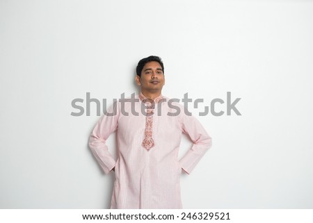 traditional indian male portrait with plain background and copyspace