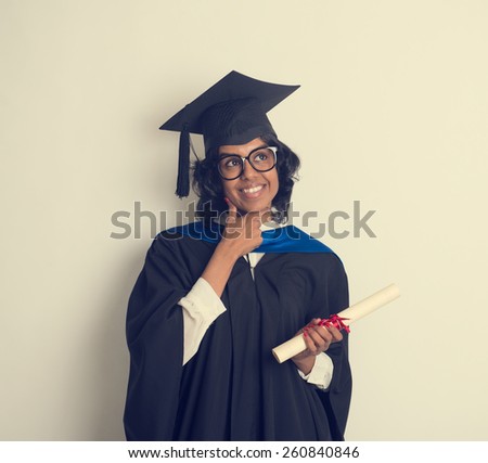 indian female student graduating in vintage tone