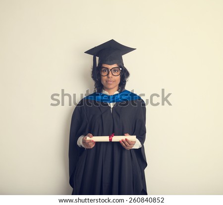 indian female student graduating in vintage tone