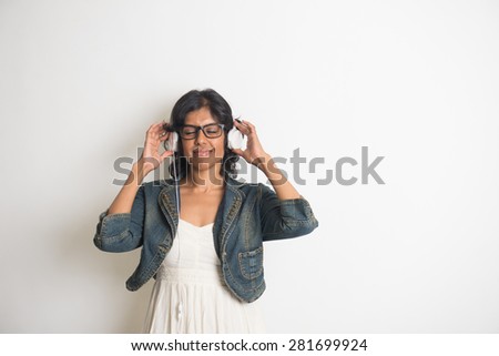 Indian girl dances while listening to her music