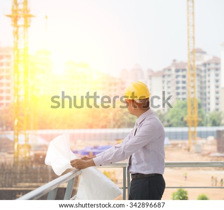 indian engineer on construction background