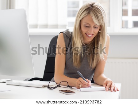 Candid portrait of young creative woman at work