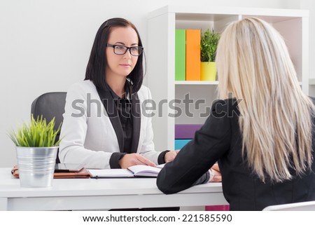 Business woman evaluating job candidate