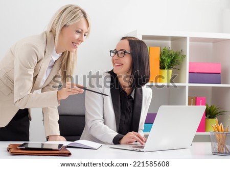 Two female colleagues working together