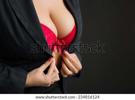 Sexy business lady wearing red bra