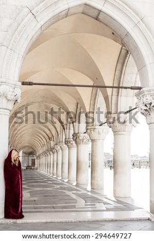Mysterious woman in red cloak