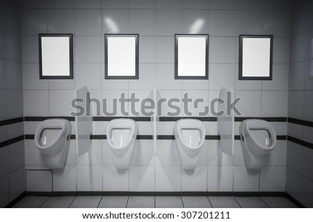 Empty advertisement frames in public toilet