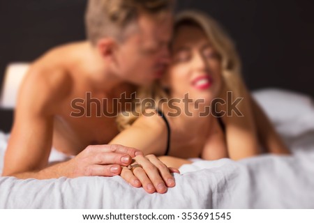 Woman and man making love