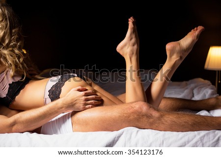 Couple having sex in bedroom