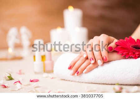 Woman at spa with well manicured nails