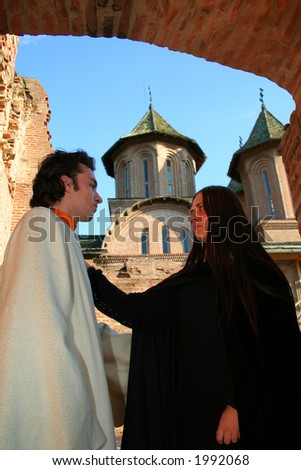 Love prince and princess in a medieval place with tower