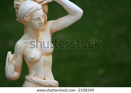 A Greek statue in a garden