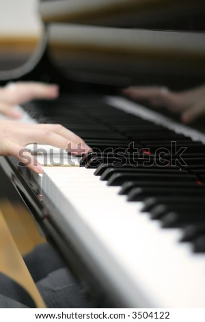 Playing piano classic music. Sound note. Shallow depth of field