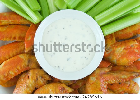 Buffalo wings, celery and blue cheese dressing