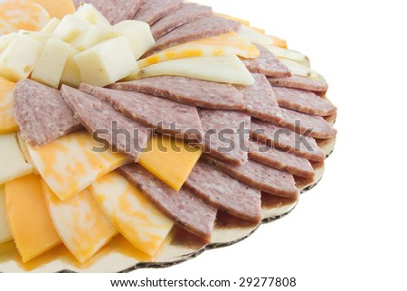 Cheese and meat tray isolated on white