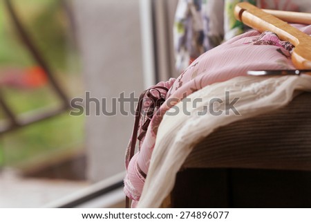Heap of clothes on  chair