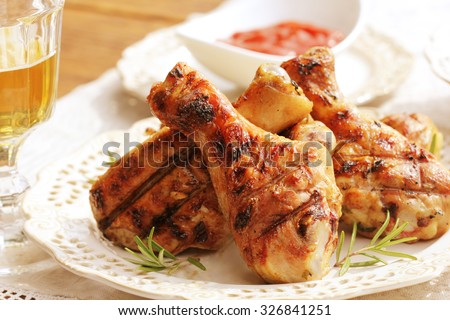 Grilled chicken legs with rosemary