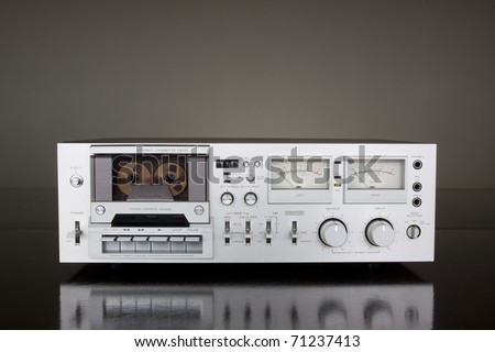 Vintage Stereo Cassette Tape Deck Recorder on the dark background