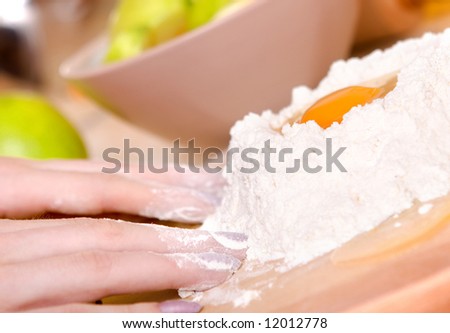Woman making apple cake