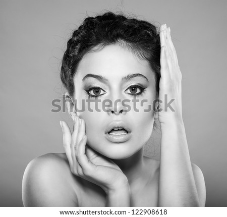 beautiful female face with natural makeup, black and white