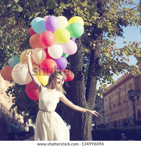 Happy Young Woman With Colorful Latex Balloons, Outdoor