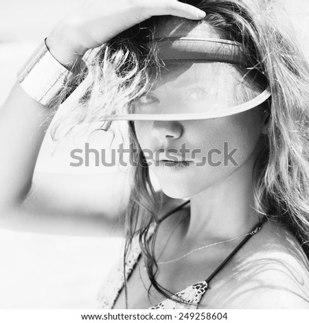 Close-up of a beautiful young  girl on the beach. Black white female face. outdoors lifestyle