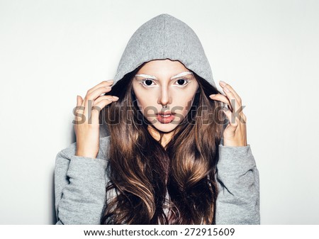 A scary evil woman with black eyes on a white background for a fear or Halloween concept. Not isolated
