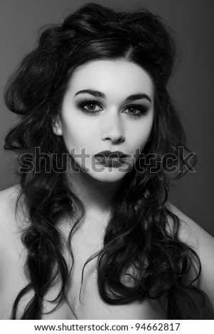  Celebrity Woman on Portrait Of Young Dark Haired Woman On Grey Background   Stock Photo