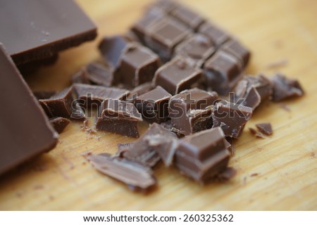 Sliced pieces of chocolate on a wooden board
