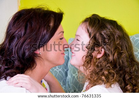 Mother With Her Daughter Face To Face