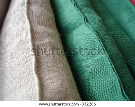grey and green pillow