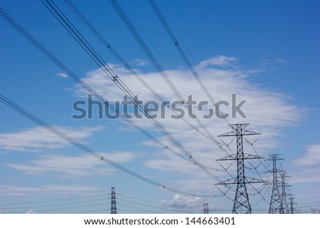 Electric power station on blue sky.