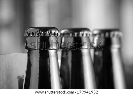 Beer Bottle - This is a high contrast black and white shot of a few beer bottles. Shot with a shallow depth of field.