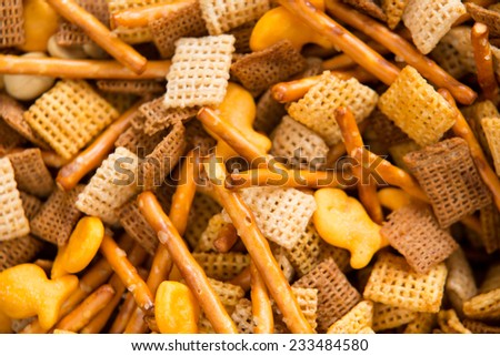 Holiday Party Food Mix - This is a close up shot of a Chex party mix containing cereal, crackers and pretzels.