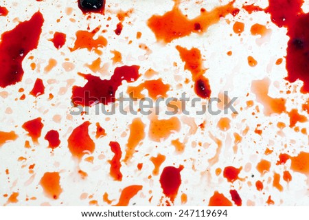 surface of an old bath tub bloodstained. close-up