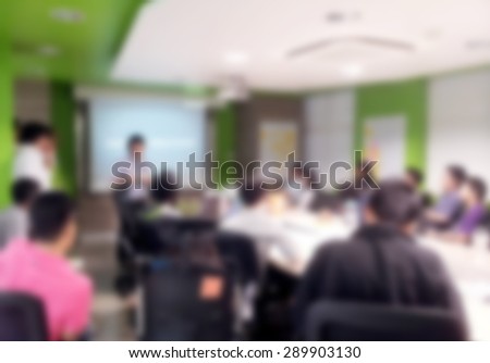 Blurred background : people brainstorm in a meeting room