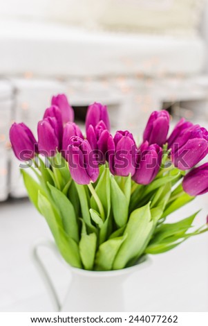 bouquet tulips on white wooden  background