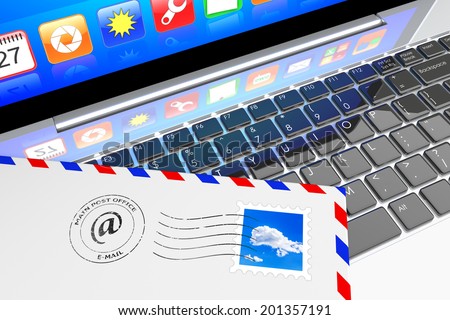 E-mail concept. Envelope letter inbox lying on laptop keyboard