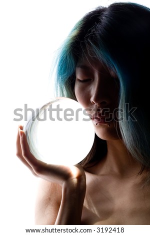 Semi silhouette of girl holding crystal ball
